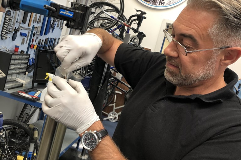 Technician Repairing Bike